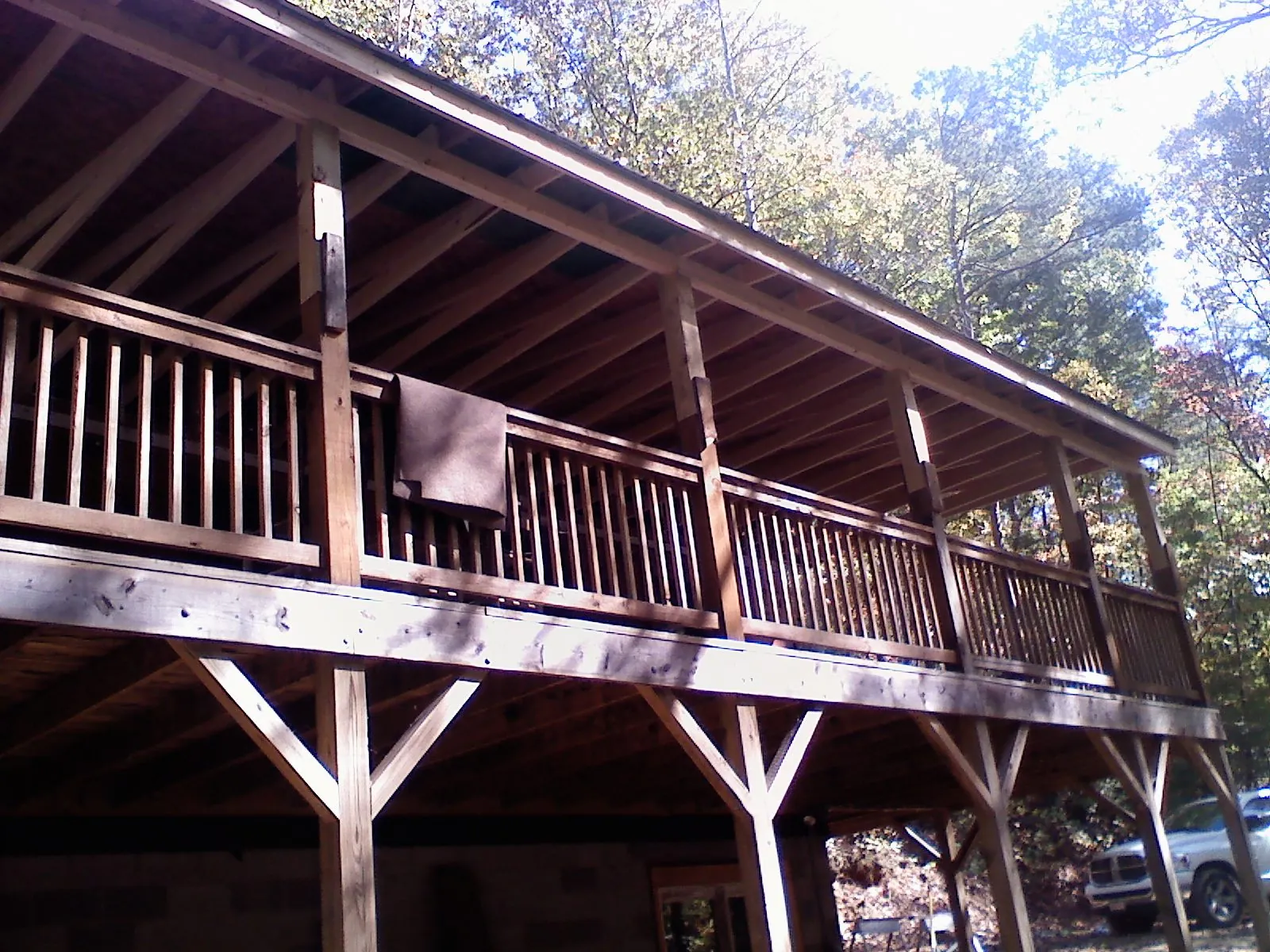 Timber framing under a new elevated porch and deck — Roof Leak Repair in East Schodack by Roofing Brothers